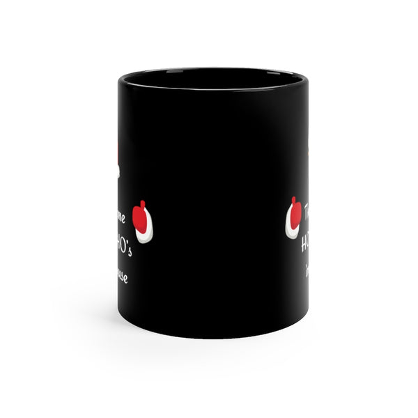 There’s some Ho Ho Ho’s in this House Black mug (11oz)